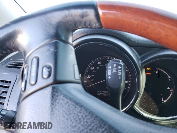 2007 Lexus RX 400h z VIN JTJGW31U172005381, wystawiony jako Copart lot #85118324 z przebiegiem 145 757 mil mil oraz Szkody całkowita. Historia ofert i sprzedaży dostępna na DreamBid. Obrazek 9.
