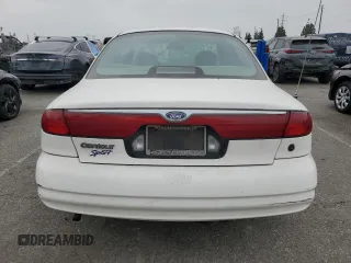 1998 Ford Contour с VIN 3FALP6536WM114921, выставлен на аукционе Copart как лот 58438865 с пробегом 99 547 миль миль и Чистый • Clean title. История ставок и продаж доступна на DreamBid. Изображение 6.