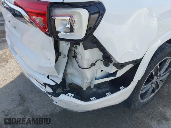 2019 GMC Acadia Denali with VIN 1GKKNPLS2KZ166670, listed as a IAAI auction lot 41673866 with 79,723 mi miles and . Bid and sale history available at carsss.com. Image 6.