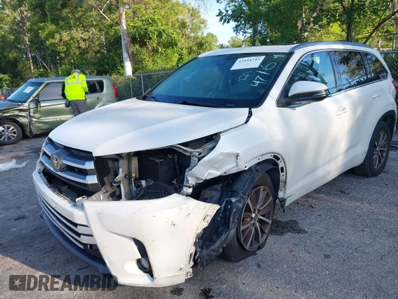 2018 Toyota Highlander SE with VIN 5TDKZRFH6JS534716, listed as a IAAI auction lot 42554743 with 154,636 mi miles and . Bid and sale history available at DreamBid. Image 6.