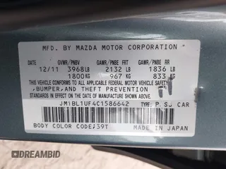 2012 Mazda 3 i Sport with VIN JM1BL1UF4C1586642, listed as a IAAI auction lot 41772930 with 145,282 mi miles and . Bid and sale history available at DreamBid. Image 9.