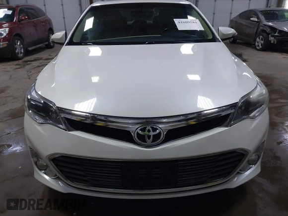 2014 Toyota Avalon Limited with VIN 4T1BK1EB6EU100635, listed as a IAAI auction lot 41609581 with 128,609 mi miles. Bid and sale history available at carsss.com. Image 12.