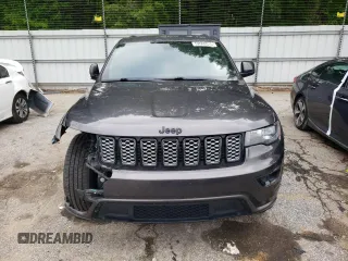 2018 Jeep Grand Cherokee Altitude with VIN 1C4RJEAG0JC208506, listed as a Copart auction lot 52669915 with 159,299 mi miles and Salvage title. Bid and sale history available at DreamBid. Image 5.