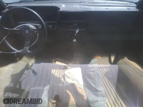 1990 Nissan Frontier with VIN 1N6SD11S9LC321876, listed as a Copart auction lot 59913575 with 119,909 mi miles and Salvage title. Bid and sale history available at DreamBid. Image 8.