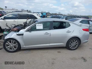 2013 Kia Optima LX z VIN 5XXGM4A73DG094160, wystawiony jako IAAI lot #41523337 z przebiegiem Nie podano mil oraz . Historia ofert i sprzedaży dostępna na DreamBid. Obrazek 13.