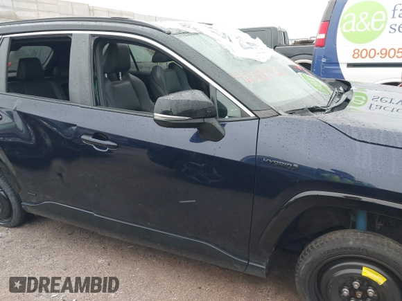 2021 Toyota RAV4 Hybrid XSE with VIN 2T3E6RFV5MW002856, listed as a IAAI auction lot 42387921 with Not provided miles and . Bid and sale history available at DreamBid. Image 12.