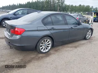 2013 BMW 3 Series 335i xDrive with VIN WBA3B9C54DJ899400, listed as a IAAI auction lot 42444539 with 132,261 mi miles and . Bid and sale history available at DreamBid. Image 4.