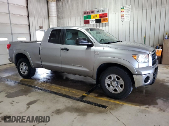 2010 Toyota Tundra с VIN 5TFUM5F11AX006417, выставлен на аукционе Copart как лот 55897725 с пробегом 203 892 миль миль и Списание • Salvage title. История ставок и продаж доступна на DreamBid. Изображение 4.