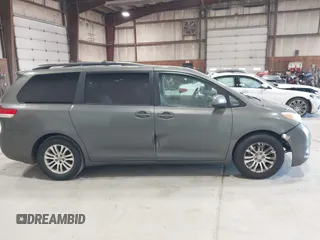 2011 Toyota Sienna XLE AAS with VIN 5TDYK3DC8BS111639, listed as a IAAI auction lot 42108488 with 300,872 mi miles and . Bid and sale history available at DreamBid. Image 13.