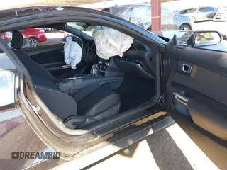 2021 Ford Mustang EcoBoost with VIN 1FA6P8TH2M5104154, listed as a IAAI auction lot 41869810 with 15,561 mi miles and . Bid and sale history available at DreamBid. Image 5.