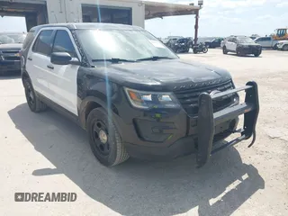 2018 Ford Police Interceptor Utility z VIN 1FM5K8AT1JGB19090, wystawiony jako IAAI lot #42413195 z przebiegiem 118 313 mil mil oraz . Historia ofert i sprzedaży dostępna na DreamBid. Obrazek 1.