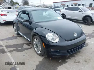 2013 Volkswagen Beetle Fender Edition with VIN 3VWJP7AT1DM612032, listed as a IAAI auction lot 41744585 with 50,505 mi miles and . Bid and sale history available at DreamBid. Image 1.