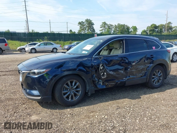 2021 Mazda CX-9 Touring with VIN JM3TCBCY7M0507699, listed as a IAAI auction lot 42603614 with 62,635 mi miles and . Bid and sale history available at DreamBid. Image 14.