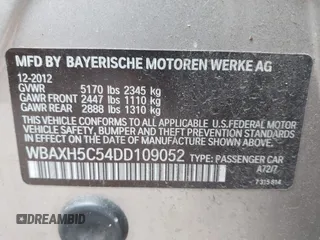 2013 BMW 5 Series 528i xDrive with VIN WBAXH5C54DD109052, listed as a IAAI auction lot 42054381 with 145,931 mi miles. Bid and sale history available at carsss.com. Image 9.