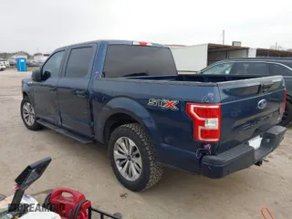 2018 Ford F-150 XL with VIN 1FTEW1CP2JFC00220, listed as a IAAI auction lot 41557424 with 263,032 mi miles. Bid and sale history available at carsss.com. Image 3.
