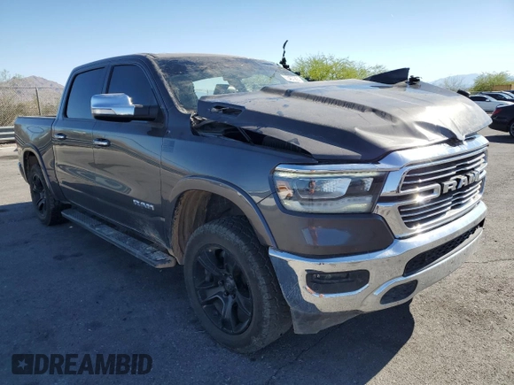 2020 Ram 1500 Laramie with VIN 1C6RREJT5LN139087, listed as a Copart auction lot 56407905 with 122,899 mi miles and Salvage title. Bid and sale history available at DreamBid. Image 4.