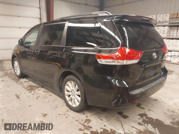 2013 Toyota Sienna XLE with VIN 5TDDK3DC0DS067993, listed as a IAAI auction lot 41597189 with 159,314 mi miles and . Bid and sale history available at DreamBid. Image 3.
