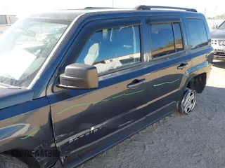 2014 Jeep Patriot Sport with VIN 1C4NJPBB4ED859196, listed as a IAAI auction lot 41815149 with 140,612 mi miles and . Bid and sale history available at carsss.com. Image 6.