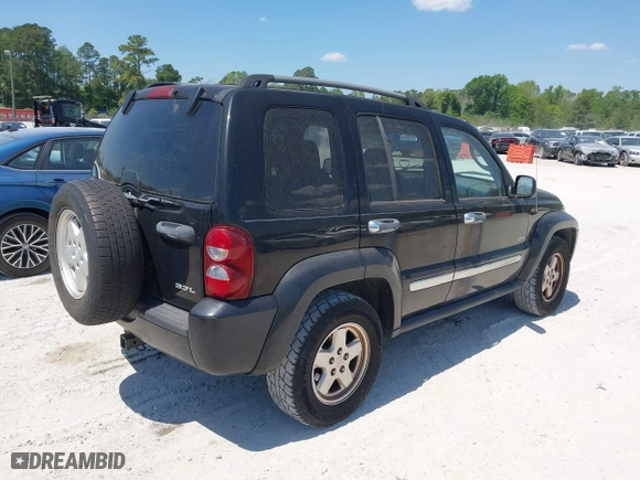 2006 Jeep Liberty Sport with VIN 1J4GK48K46W246801, listed as a IAAI auction lot 42048509 with 219,077 mi miles. Bid and sale history available at carsss.com. Image 4.