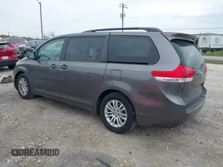 2013 Toyota Sienna XLE AAS with VIN 5TDYK3DC5DS405535, listed as a IAAI auction lot 42348931 with 186,177 mi miles and . Bid and sale history available at DreamBid. Image 3.