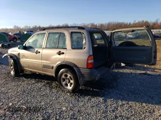 2002 Chevrolet Tracker ZR2 with VIN 2CNBJ734826902012, listed as a Copart auction lot 79226854 with 80,460 mi miles and Salvage title. Bid and sale history available at DreamBid. Image 2.