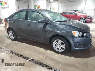 2014 Chevrolet Sonic LT with VIN 1G1JC5SH4E4239958, listed as a Copart auction lot 46082295 with 128,275 mi miles and Salvage Title. Bid and sale history available at DreamBid. Image 4.