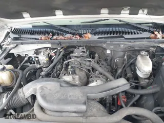 2004 Chevrolet Tahoe LT with VIN 1GNEC13ZX4J131652, listed as a IAAI auction lot 41551921 with 395,802 mi miles. Bid and sale history available at carsss.com. Image 10.