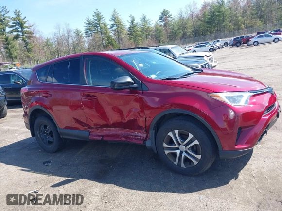 2018 Toyota RAV4 LE with VIN JTMBFREV2JD228186, listed as a IAAI auction lot 42076730 with 93,899 mi miles. Bid and sale history available at carsss.com. Image 13.