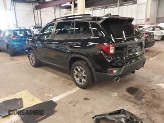 2023 Honda Passport TrailSport with VIN 5FNYF8H64PB016819, listed as a IAAI auction lot 41997402 with 22,106 mi miles and . Bid and sale history available at DreamBid. Image 3.