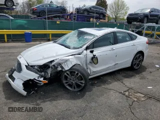 2020 Ford Fusion Titanium z VIN 3FA6P0D96LR205475, wystawiony jako Copart lot #56313075 z przebiegiem 30 888 mil mil oraz Szkoda całkowita • Salvage title. Historia ofert i sprzedaży dostępna na DreamBid. Obrazek 1.