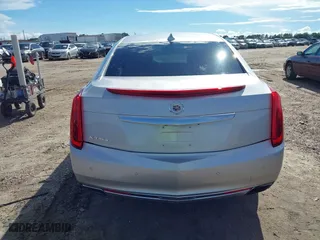 2015 Cadillac XTS Luxury with VIN 2G61N5S36F9251701, listed as a IAAI auction lot 40315224 with 99,918 mi miles. Bid and sale history available at carsss.com. Image 16.
