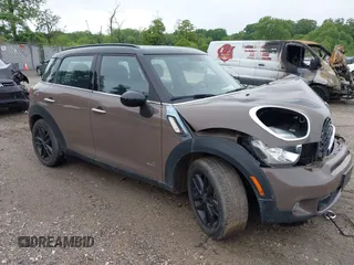 2014 MINI Countryman S with VIN WMWZC5C55EWP41717, listed as a IAAI auction lot 42324347 with Not provided miles and . Bid and sale history available at DreamBid. Image 1.