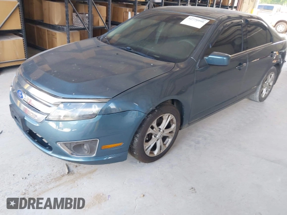 2012 Ford Fusion SE z VIN 3FAHP0HG6CR170633, wystawiony jako IAAI lot #42770990 z przebiegiem 233 383 mil mil oraz . Historia ofert i sprzedaży dostępna na DreamBid. Obrazek 2.