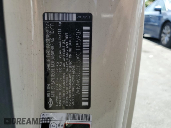 2012 MINI Hardtop z VIN WMWSU3C5XCT185907, wystawiony jako Copart lot #60842065 z przebiegiem 81 221 mil mil oraz Szkoda całkowita • Salvage title. Historia ofert i sprzedaży dostępna na DreamBid. Obrazek 12.
