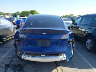 2023 Tesla Model Y Long Range with VIN 7SAYGDEE0PF762592, listed as a IAAI auction lot 41983933 with 28,510 mi miles and . Bid and sale history available at carsss.com. Image 16.