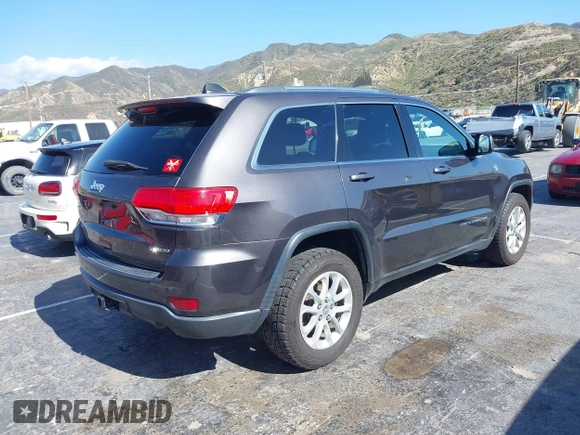 2016 Jeep Grand Cherokee Laredo z VIN 1C4RJFAG5GC390413, wystawiony jako IAAI lot #42254165 z przebiegiem 99 231 mil mil oraz . Historia ofert i sprzedaży dostępna na DreamBid. Obrazek 4.