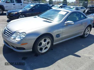 2004 Mercedes-Benz SL 500 with VIN WDBSK75F64F072167, listed as a IAAI auction lot 41862494 with 68,025 mi miles and . Bid and sale history available at DreamBid. Image 2.