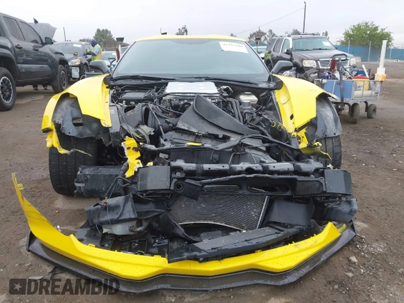 2015 Chevrolet Corvette Z06 3LZ z VIN 1G1YU2D67F5603369, wystawiony jako IAAI lot #42193440 z przebiegiem 17 618 mil mil oraz . Historia ofert i sprzedaży dostępna na DreamBid. Obrazek 13.