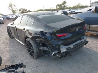 2020 BMW M8 with VIN WBSGV0C06LCD99264, listed as a IAAI auction lot 40276722 with 38,039 mi miles. Bid and sale history available at carsss.com. Image 3.
