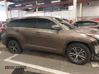 2018 Toyota Highlander LE with VIN 5TDBZRFH7JS492041, listed as a IAAI auction lot 41642278 with 90,019 mi miles and . Bid and sale history available at DreamBid. Image 14.