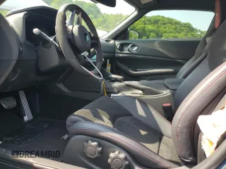 2024 Nissan Z Nismo z VIN JN1BZ4CH8RM363453, wystawiony jako Copart lot #59744335 z przebiegiem 123 mil mil oraz Szkoda całkowita • Salvage title. Historia ofert i sprzedaży dostępna na DreamBid. Obrazek 7.