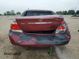 2005 Toyota Camry LE with VIN 4T1BE30KX5U086586, listed as a Copart auction lot 60291715 with 180,421 mi miles and Salvage title. Bid and sale history available at DreamBid. Image 6.