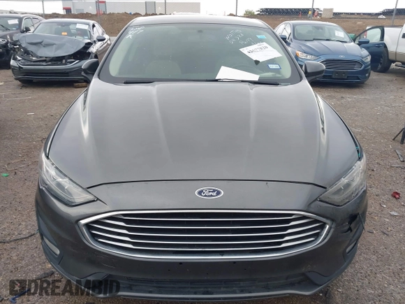 2020 Ford Fusion SE z VIN 3FA6P0HD5LR198744, wystawiony jako IAAI lot #42177820 z przebiegiem 97 520 mil mil oraz . Historia ofert i sprzedaży dostępna na DreamBid. Obrazek 12.