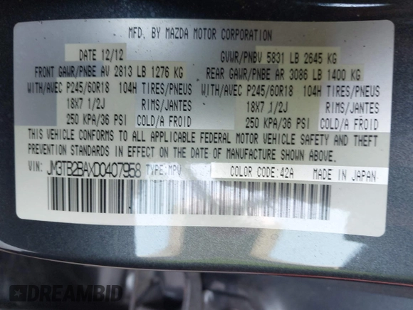 2013 Mazda CX-9 Sport with VIN JM3TB2BAXD0407958, listed as a IAAI auction lot 42346949 with 132,855 mi miles and . Bid and sale history available at DreamBid. Image 9.
