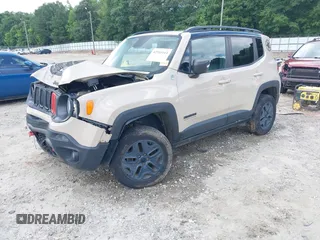 2017 Jeep Renegade Trailhawk with VIN ZACCJBCB5HPF70617, listed as a IAAI auction lot 42516113 with 66,187 mi miles and . Bid and sale history available at DreamBid. Image 2.