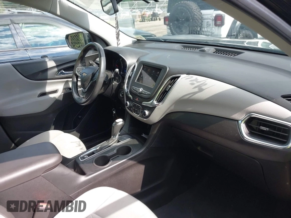 2019 Chevrolet Equinox LT z VIN 2GNAXKEV0K6247052, wystawiony jako IAAI lot #42192710 z przebiegiem 76 813 mil mil oraz . Historia ofert i sprzedaży dostępna na DreamBid. Obrazek 5.