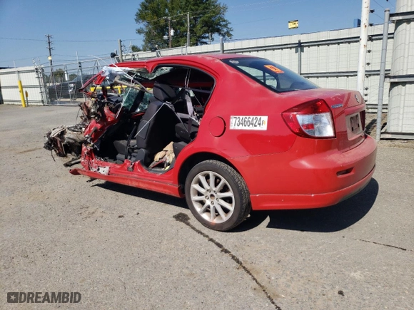 2009 Suzuki SX4 Touring Pkg 2 with VIN JS2YC417996201490, listed as a Copart auction lot 73466424 with 0 mi miles and Salvage Title. Bid and sale history available at carsss.com. Image 2.