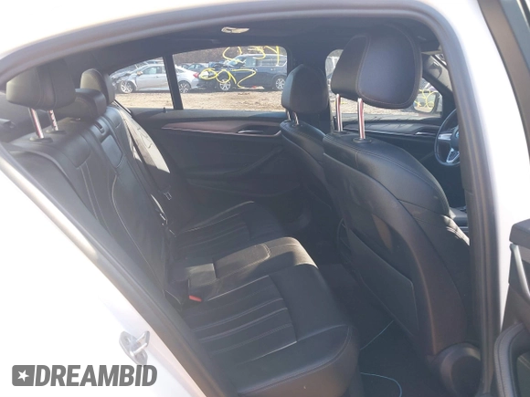 2018 BMW 5 Series 530i xDrive with VIN WBAJA7C58JG907988, listed as a IAAI auction lot 38011708 with Not provided miles and . Bid and sale history available at DreamBid. Image 8.