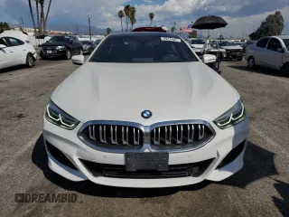 2023 BMW 8 Series 840i with VIN WBAGV4C01PCL65666, listed as a Copart auction lot 47543754 with 31,703 mi miles. Bid and sale history available at carsss.com. Image 5.