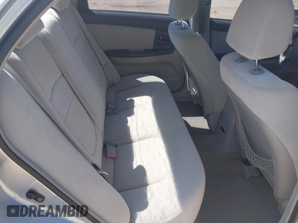 2005 Kia Spectra LX with VIN KNAFE121955107403, listed as a IAAI auction lot 42055036 with 157,605 mi miles. Bid and sale history available at carsss.com. Image 8.